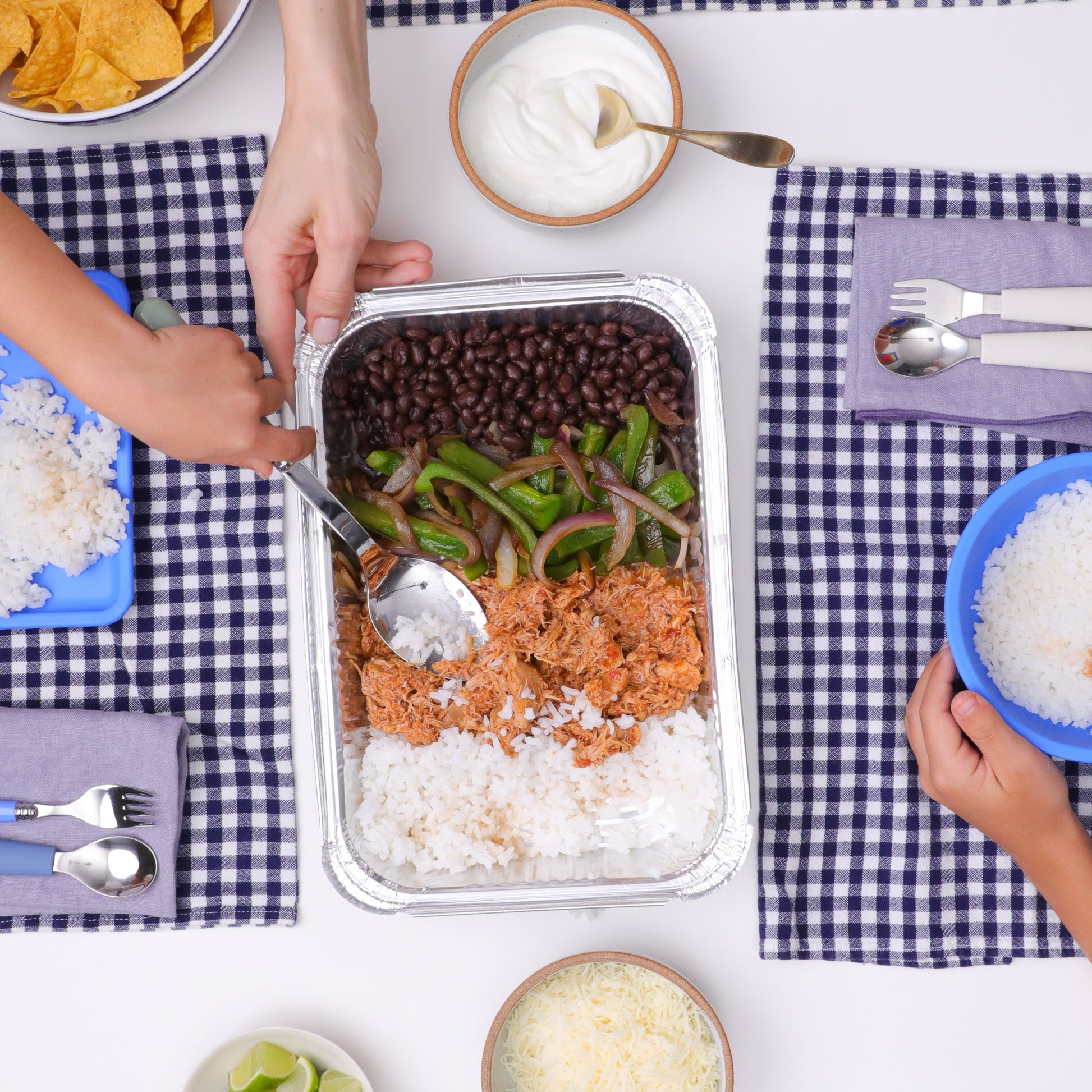 Chicken Tinga Burrito Bowl with tender chicken, succulent black beans, buttery rice, and fresh fajita veggies from Kitchenette, a Santa Barbara based family meal delivery service.